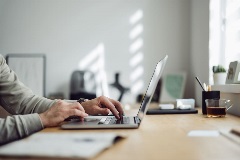 Lawyer working from home on laptop